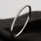 14k white gold diamond bangle with 0.22ct round brilliant stones