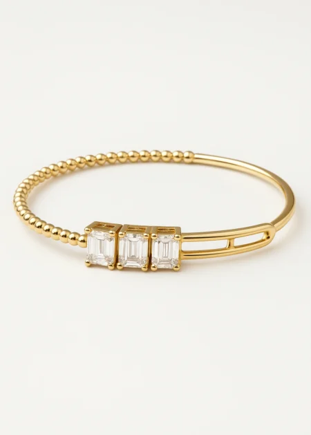 14k yellow gold diamond bangle with emerald cut design