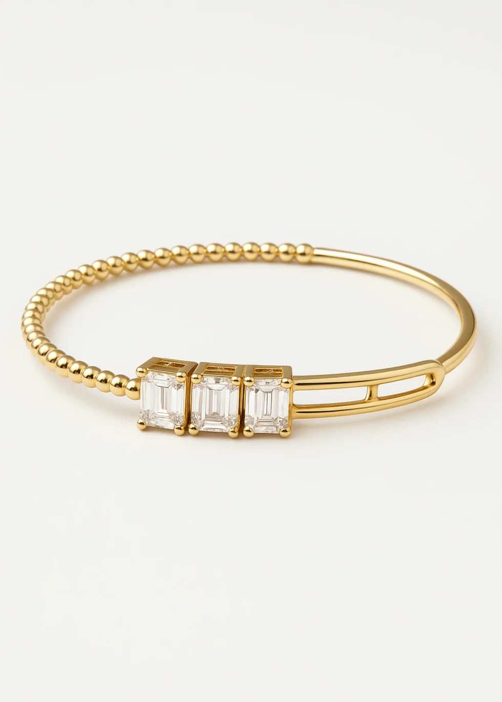 14k yellow gold diamond bangle with emerald cut design