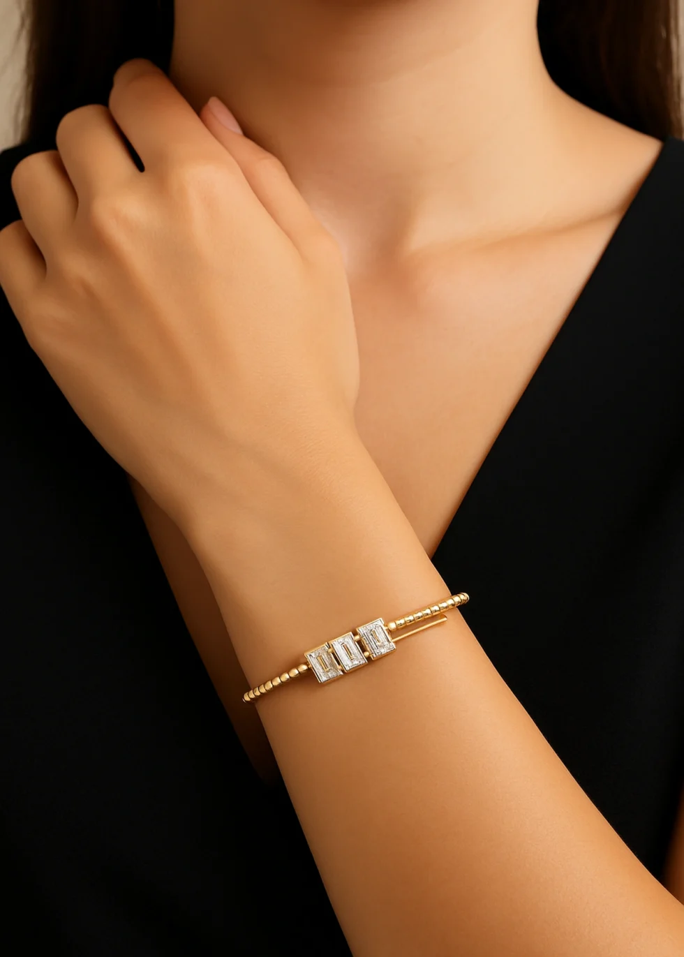 14k yellow gold diamond bangle with emerald cut design