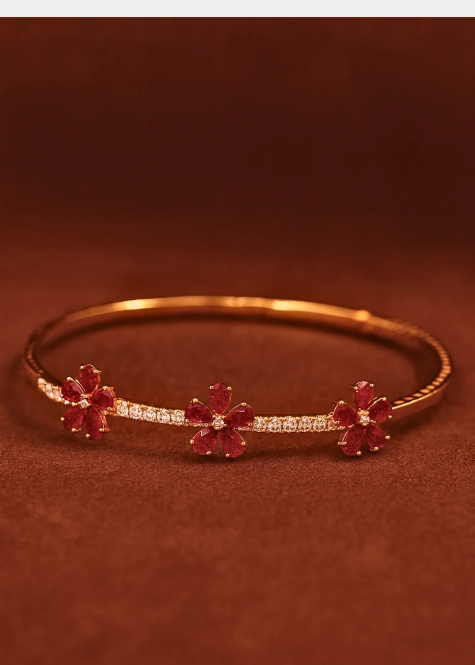 14k yellow gold ruby bangle with diamond accents