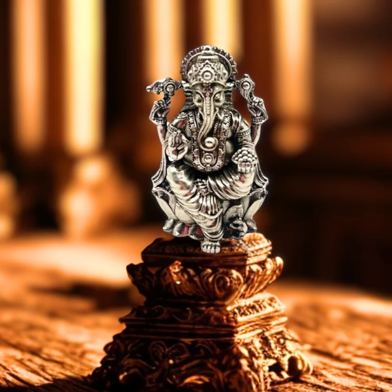 handcrafted pure silver ganesha idol with ornate base design