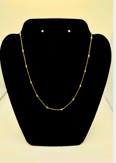 Enhance your everyday style with this elegant 22KT Gold Chain, crafted with delicate gold and white beaded accents. Weighing 5.26 grams, its minimalist design makes it perfect for daily wear, layering with pendants, or gifting. A timeless staple for any fine jewelry collection.