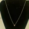 14KT gold initial K pendant with diamond accent
