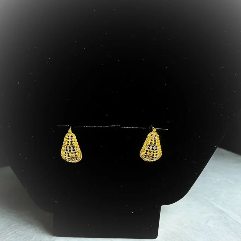 Discover the Naira 22KT Gold Drop Earrings with a delicate mesh design. Lightweight, elegant, and perfect for daily wear or celebrations. Shipped securely across the USA.