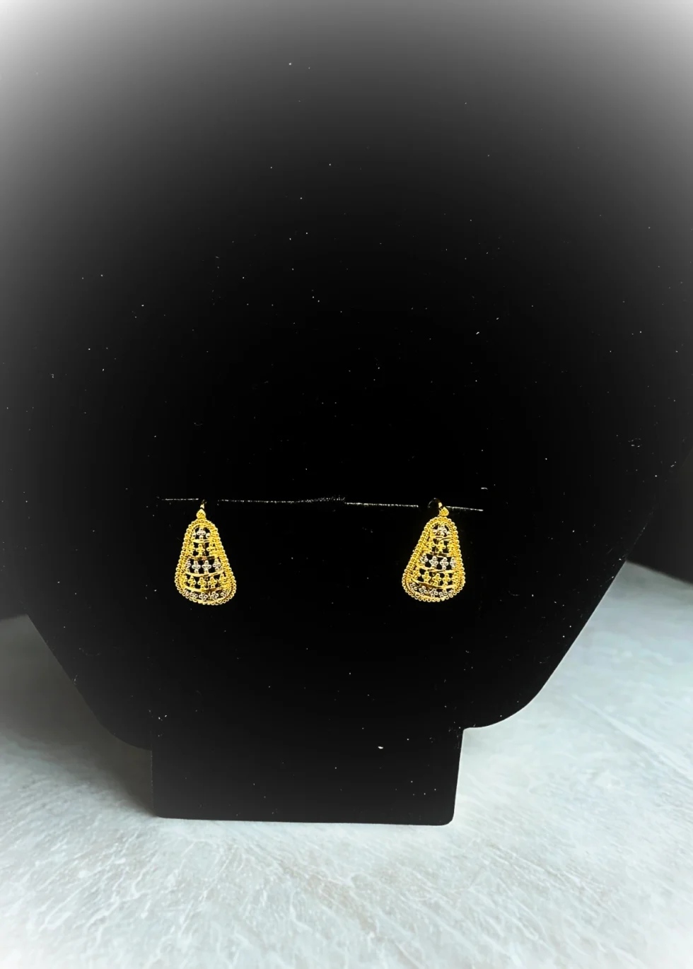 Discover the Naira 22KT Gold Drop Earrings with a delicate mesh design. Lightweight, elegant, and perfect for daily wear or celebrations. Shipped securely across the USA.