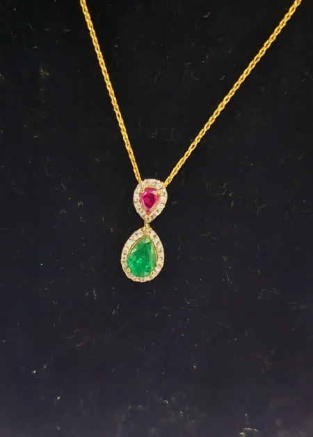 Royal Harmony ruby emerald pendant in 14KT gold with diamonds
