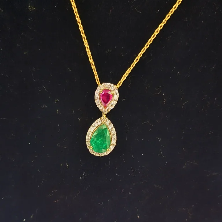 Royal Harmony ruby emerald pendant in 14KT gold with diamonds