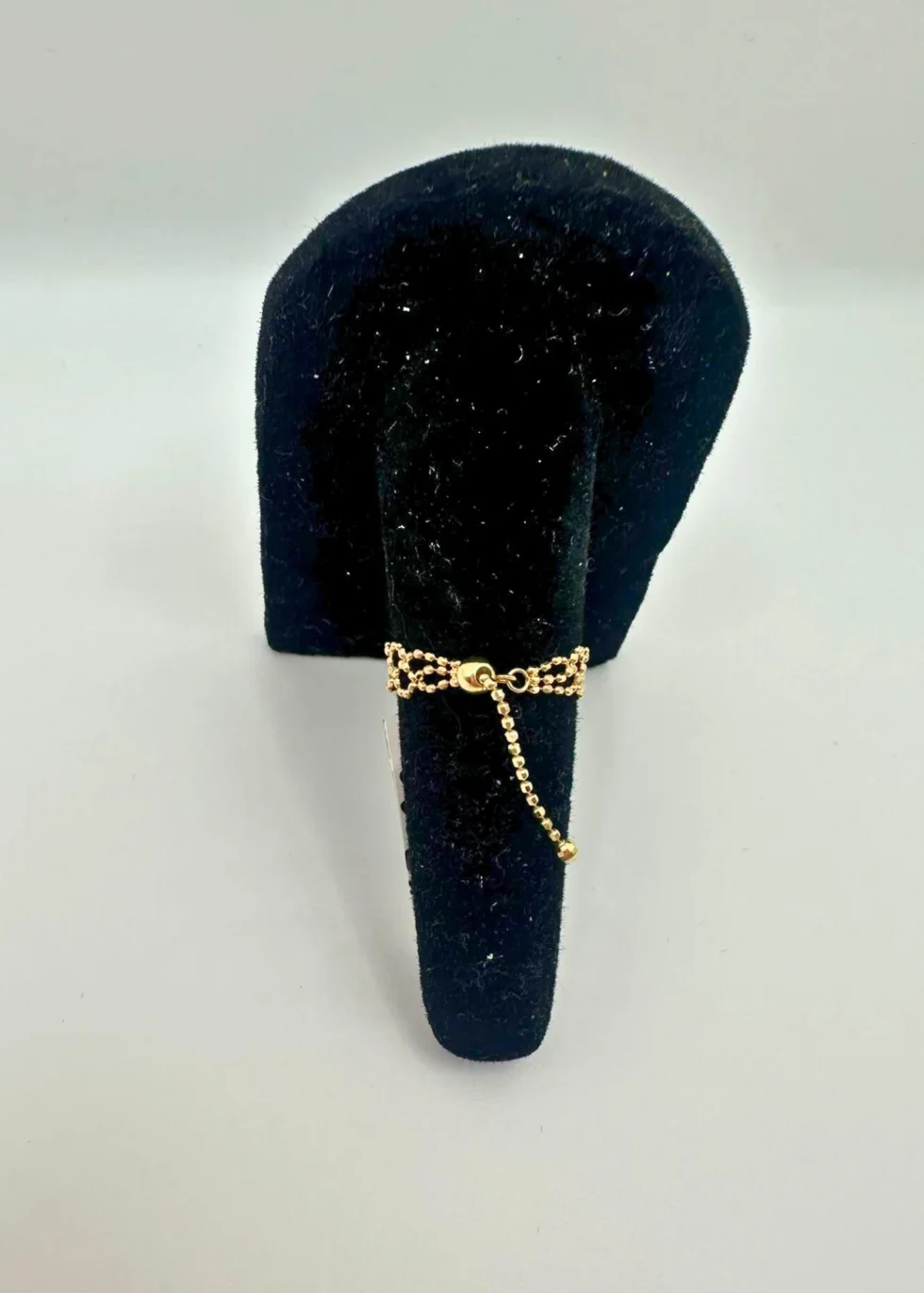 Ruby halo 18KT gold chain bracelet with oval gemstone