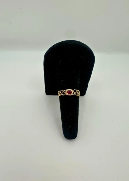 Ruby halo 18KT gold chain bracelet with oval gemstone
