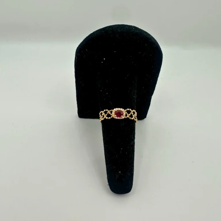 Ruby halo 18KT gold chain bracelet with oval gemstone