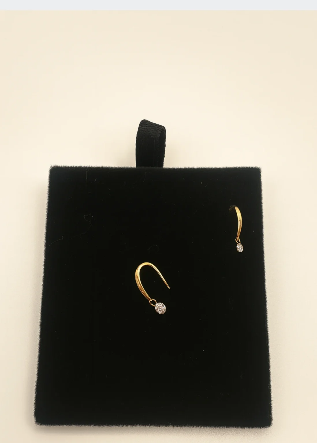 18KT gold diamond drop earrings with curved design