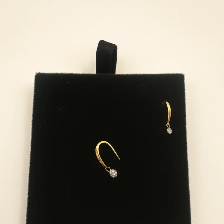 18KT gold diamond drop earrings with curved design