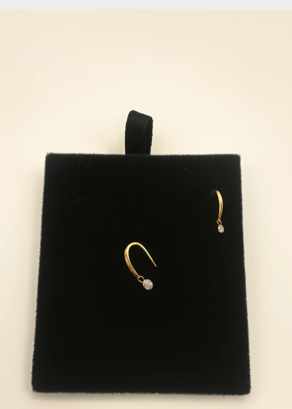 18KT gold diamond drop earrings with curved design