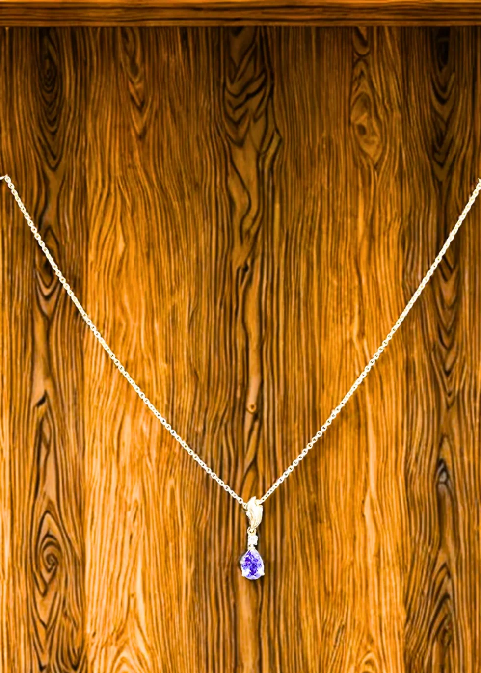 Violet drop tanzanite gold pendant in 14KT gold